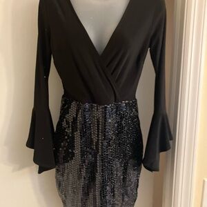 Beautiful front low cut women’s dress sequin bottom ruffled cuffs NWT